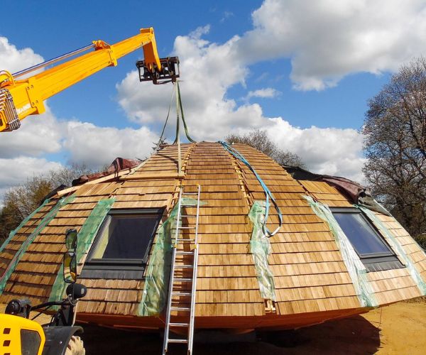 Toiture en bardeaux de bois installée sur la maison Domespace